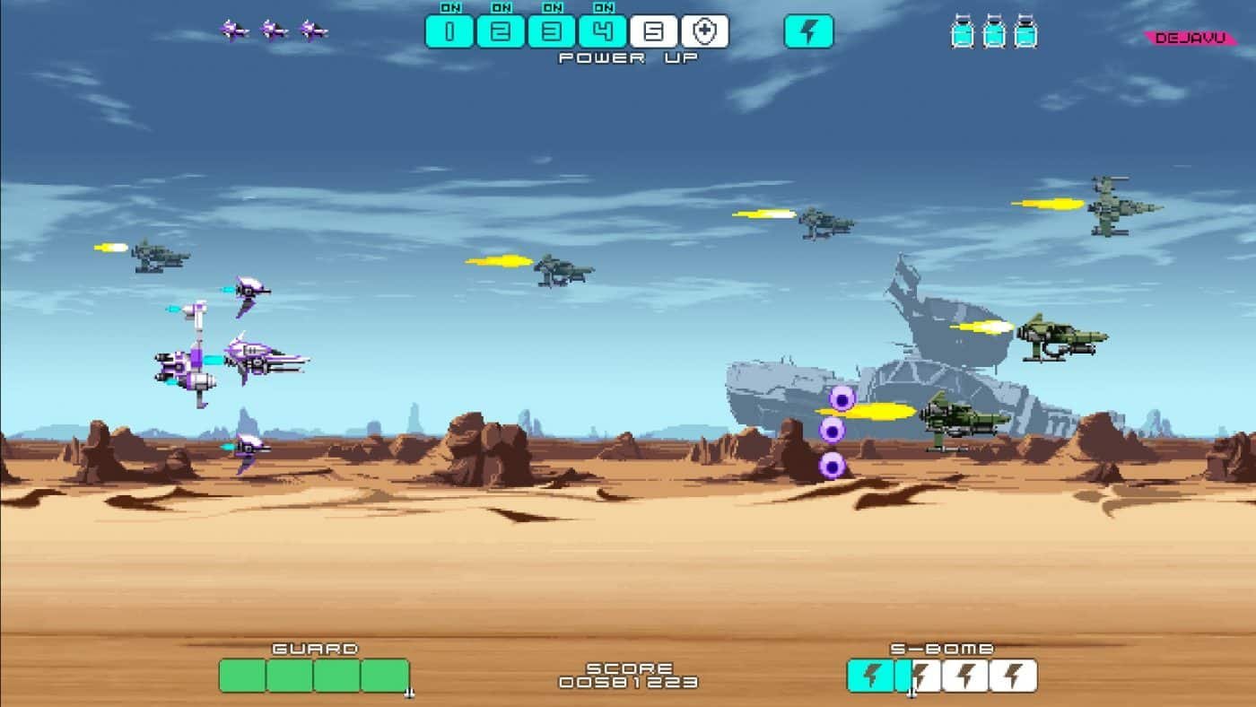 Spaceships fly over a desert landscape. 4 out of 5 powerup icons are filled in blue at the top of the screen.