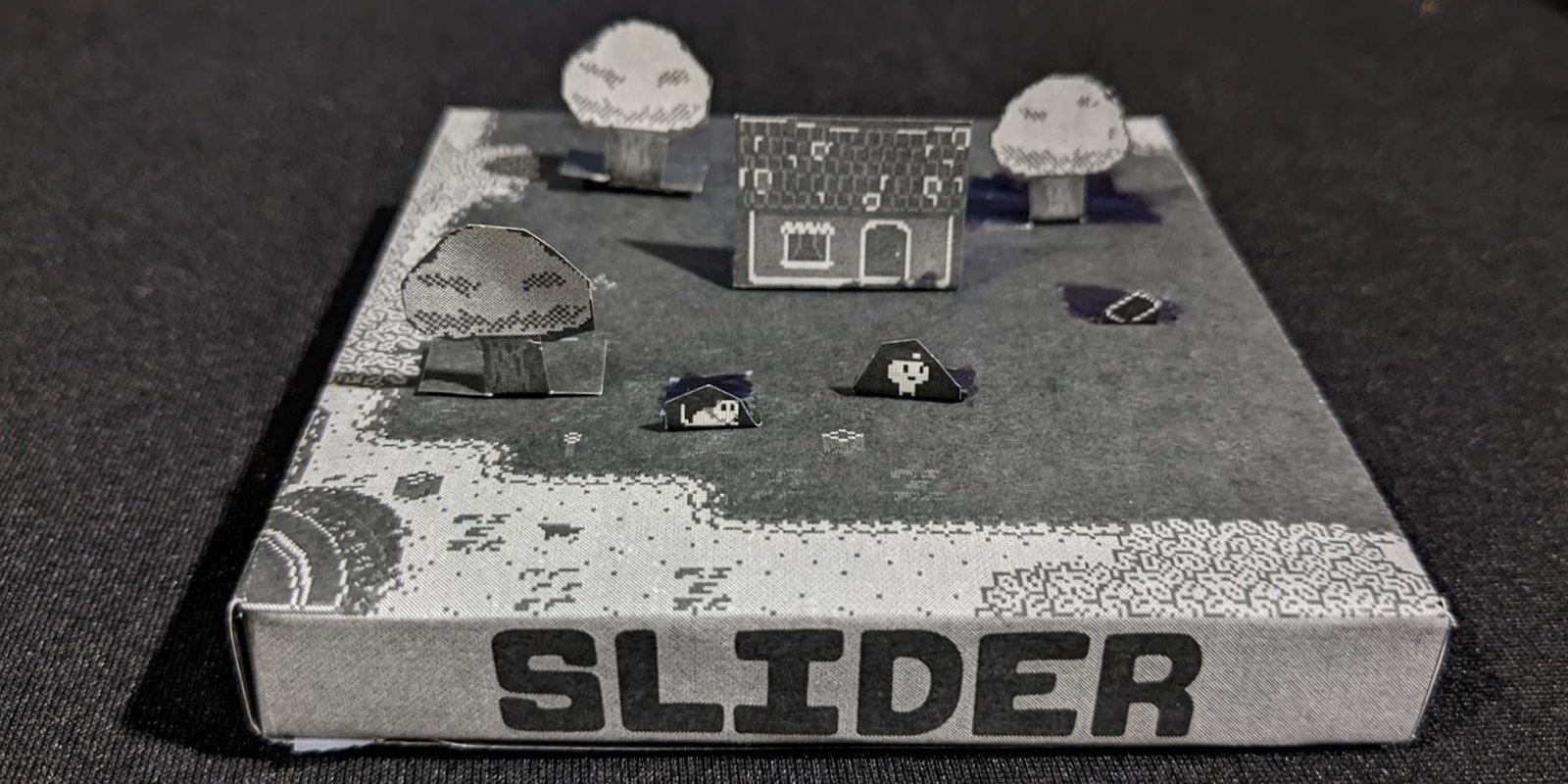 Paper craft model of the slider game world