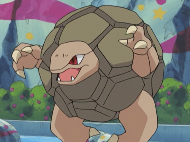 An image from the pokémon anime of golem, a squat living boulder.