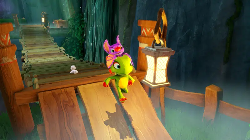 Yooka and laylee running through the deep dark cave
