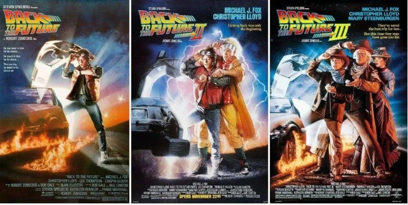 All three iconic movie posters for the "back to the future" trilogy starring michael j. Fox and christopher lloyd!