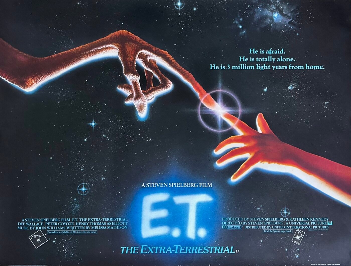 Movie poster for steven spielberg's "E.T. - The Extra-Terrestrial" - Tagline: He is afraid. He is totally alone. He is 3 million light years from home. 