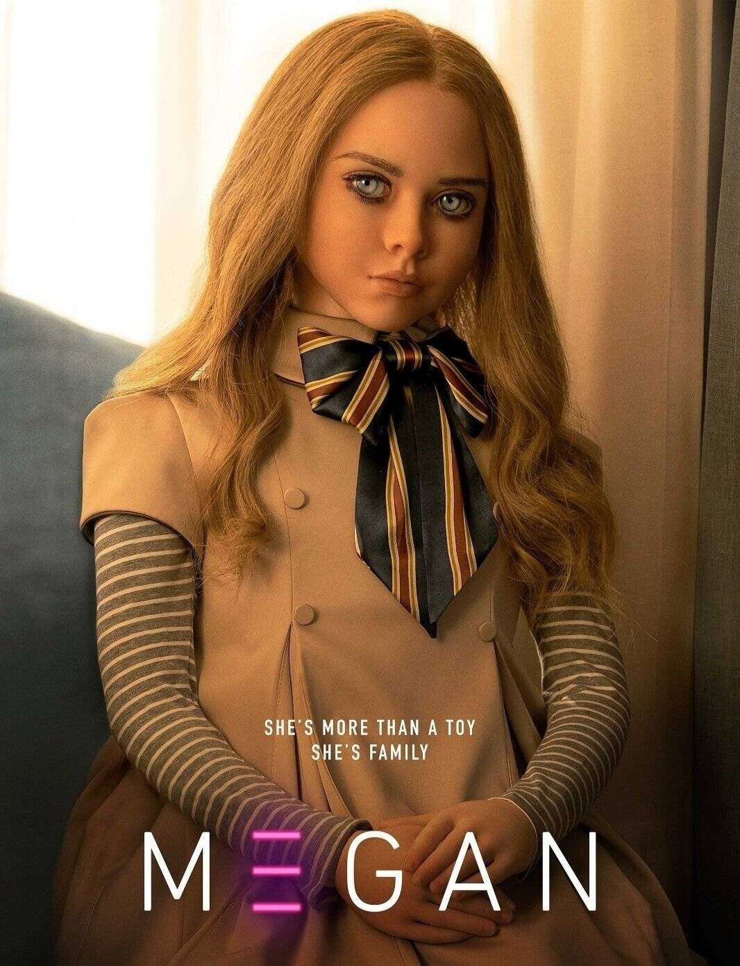 Movie poster for "m3gan" - tagline: "she's More Than a Toy, She's Family."
