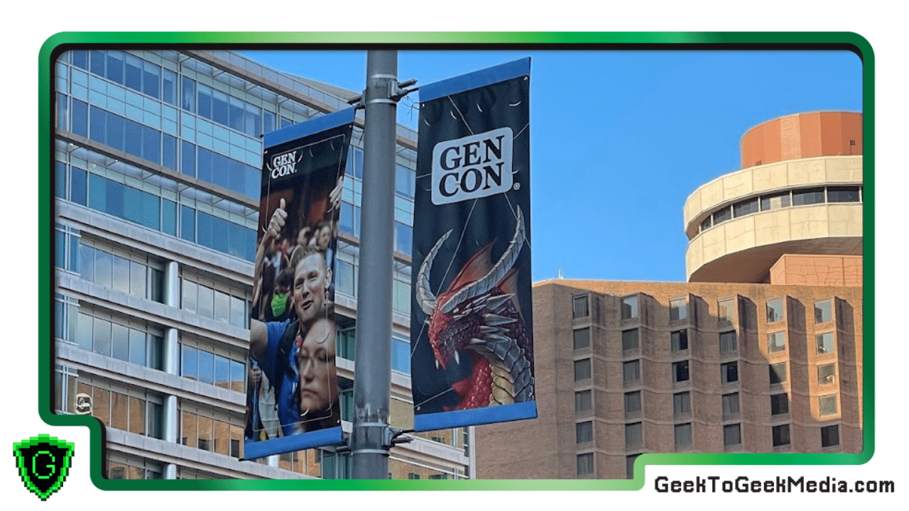 Gen Con 2026 Banner on a Streetlight with Genevieve the Dragon on the right-hand side in downtown Indianapolis